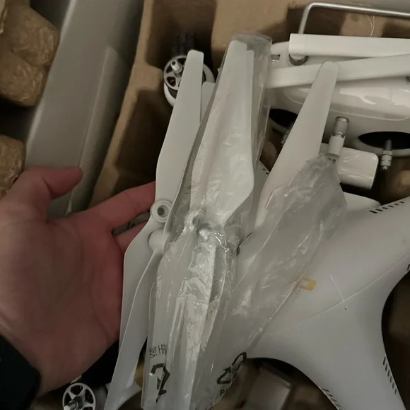 DJI White and Gold Drone with Controller